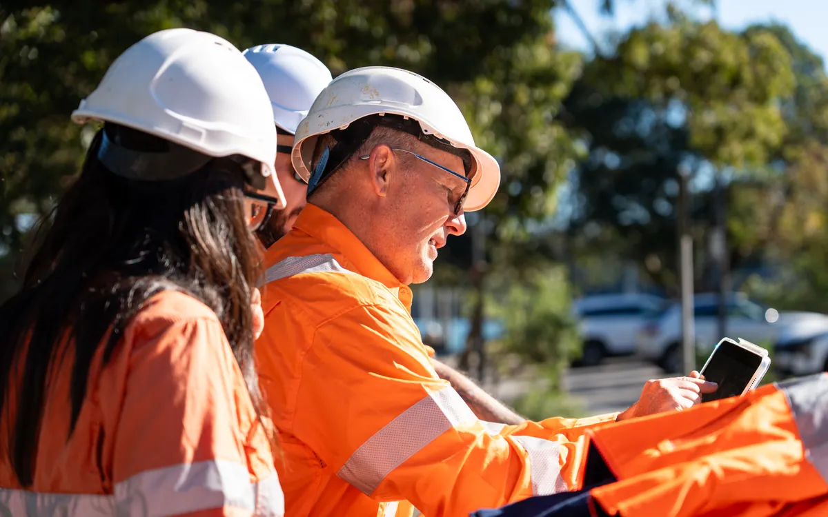 LCG team reviewing project plans together on site